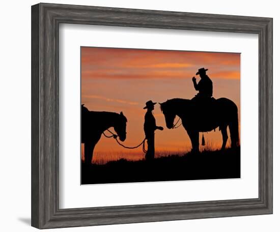 Cowboy and Cowgirl Silhouetted on a Ridge in the Big Horn Mountains, Wyoming, USA-Joe Restuccia III-Framed Photographic Print