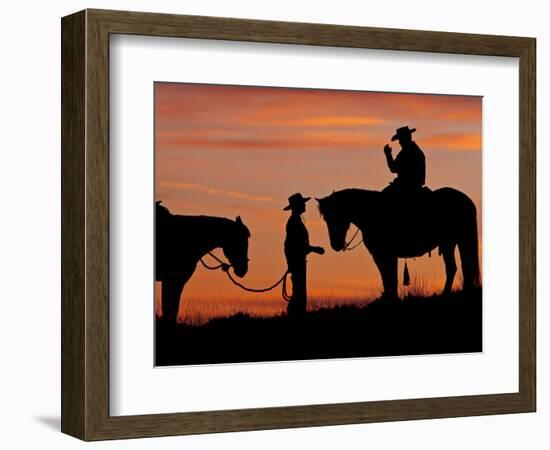 Cowboy and Cowgirl Silhouetted on a Ridge in the Big Horn Mountains, Wyoming, USA-Joe Restuccia III-Framed Photographic Print