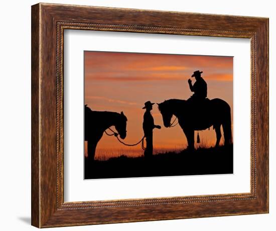 Cowboy and Cowgirl Silhouetted on a Ridge in the Big Horn Mountains, Wyoming, USA-Joe Restuccia III-Framed Photographic Print