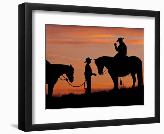 Cowboy and Cowgirl Silhouetted on a Ridge in the Big Horn Mountains, Wyoming, USA-Joe Restuccia III-Framed Photographic Print