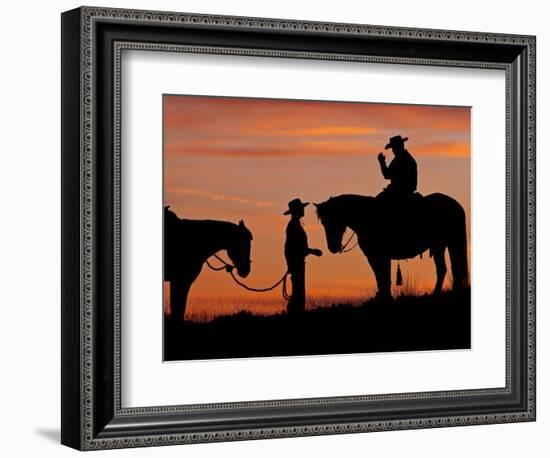 Cowboy and Cowgirl Silhouetted on a Ridge in the Big Horn Mountains, Wyoming, USA-Joe Restuccia III-Framed Photographic Print