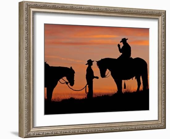 Cowboy and Cowgirl Silhouetted on a Ridge in the Big Horn Mountains, Wyoming, USA-Joe Restuccia III-Framed Photographic Print