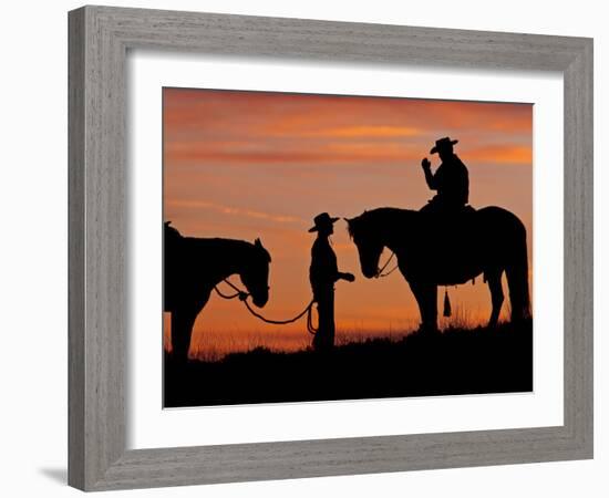 Cowboy and Cowgirl Silhouetted on a Ridge in the Big Horn Mountains, Wyoming, USA-Joe Restuccia III-Framed Photographic Print