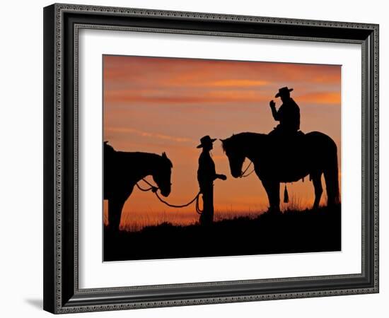 Cowboy and Cowgirl Silhouetted on a Ridge in the Big Horn Mountains, Wyoming, USA-Joe Restuccia III-Framed Photographic Print