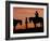 Cowboy and Cowgirl Silhouetted on a Ridge in the Big Horn Mountains, Wyoming, USA-Joe Restuccia III-Framed Photographic Print