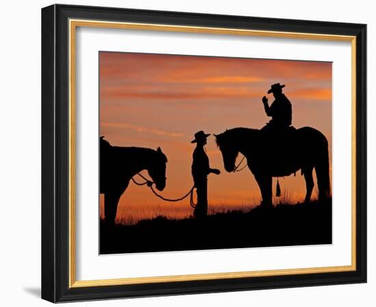 Cowboy and Cowgirl Silhouetted on a Ridge in the Big Horn Mountains, Wyoming, USA-Joe Restuccia III-Framed Photographic Print