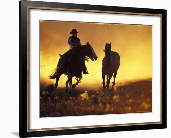 Cowboy and Horse at Sunset, Ponderosa Ranch, Seneca, Oregon, USA-Darrell Gulin-Framed Photographic Print