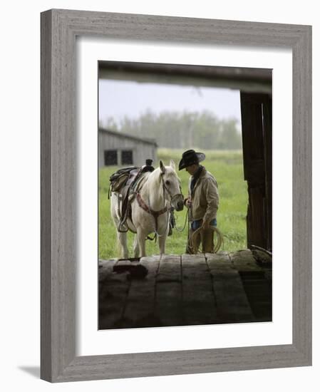 Cowboy and Horse in the Rain, Judith Gap, Montana, USA-Chuck Haney-Framed Photographic Print