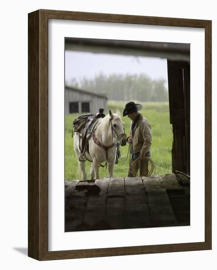 Cowboy and Horse in the Rain, Judith Gap, Montana, USA-Chuck Haney-Framed Photographic Print