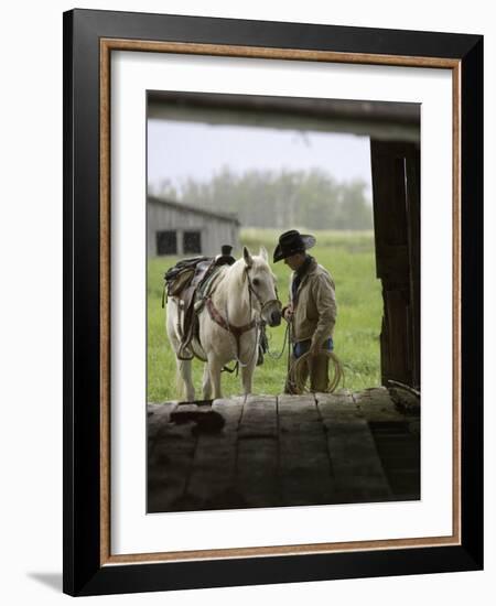 Cowboy and Horse in the Rain, Judith Gap, Montana, USA-Chuck Haney-Framed Photographic Print