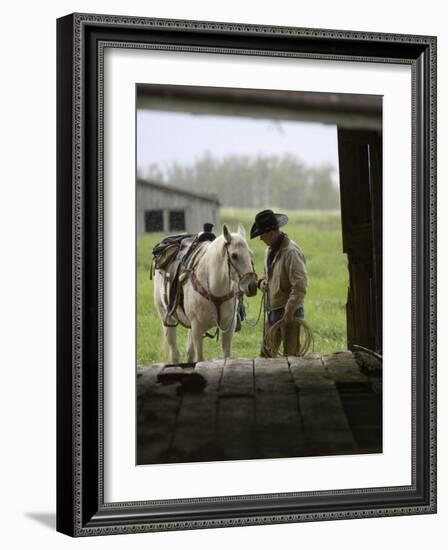 Cowboy and Horse in the Rain, Judith Gap, Montana, USA-Chuck Haney-Framed Photographic Print