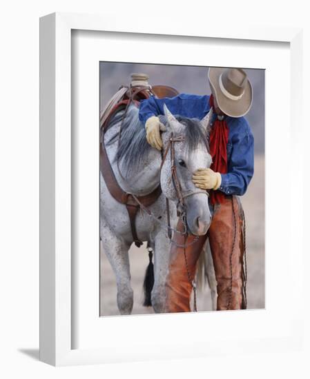 Cowboy Leading and Stroking His Horse, Flitner Ranch, Shell, Wyoming, USA-Carol Walker-Framed Premium Photographic Print