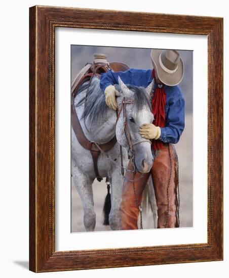 Cowboy Leading and Stroking His Horse, Flitner Ranch, Shell, Wyoming, USA-Carol Walker-Framed Photographic Print