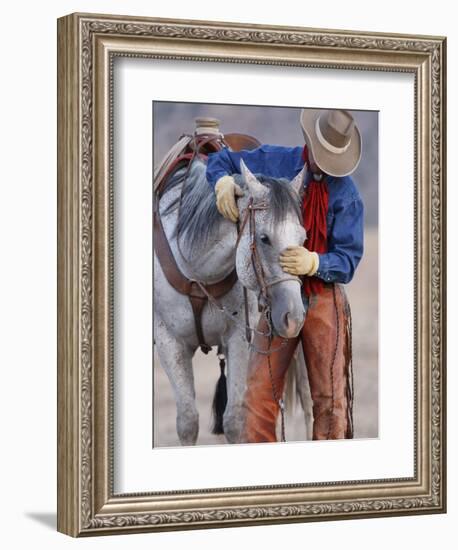 Cowboy Leading and Stroking His Horse, Flitner Ranch, Shell, Wyoming, USA-Carol Walker-Framed Photographic Print