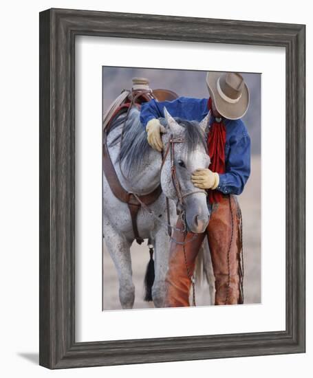 Cowboy Leading and Stroking His Horse, Flitner Ranch, Shell, Wyoming, USA-Carol Walker-Framed Photographic Print