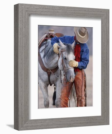 Cowboy Leading and Stroking His Horse, Flitner Ranch, Shell, Wyoming, USA-Carol Walker-Framed Photographic Print