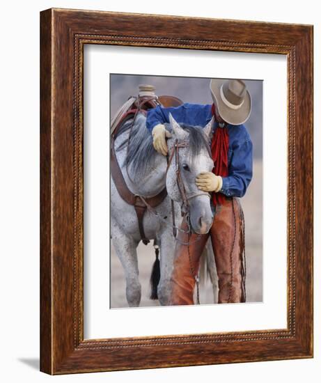 Cowboy Leading and Stroking His Horse, Flitner Ranch, Shell, Wyoming, USA-Carol Walker-Framed Photographic Print