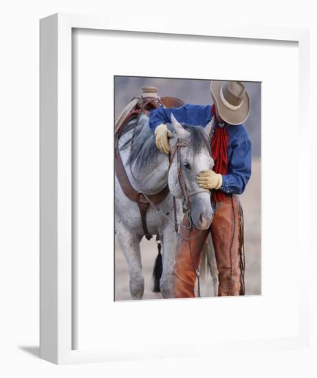 Cowboy Leading and Stroking His Horse, Flitner Ranch, Shell, Wyoming, USA-Carol Walker-Framed Photographic Print