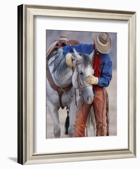 Cowboy Leading and Stroking His Horse, Flitner Ranch, Shell, Wyoming, USA-Carol Walker-Framed Photographic Print