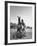 Cowboy Mounting a Horse-Carl Mydans-Framed Photographic Print