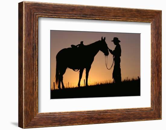 Cowboy Petting Horse at Sunset-Darrell Gulin-Framed Photographic Print