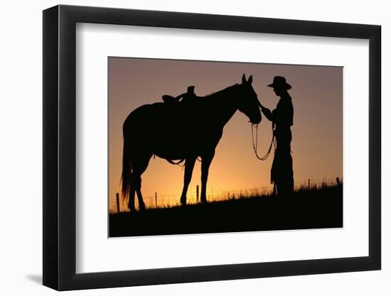 Cowboy Petting Horse at Sunset-Darrell Gulin-Framed Photographic Print