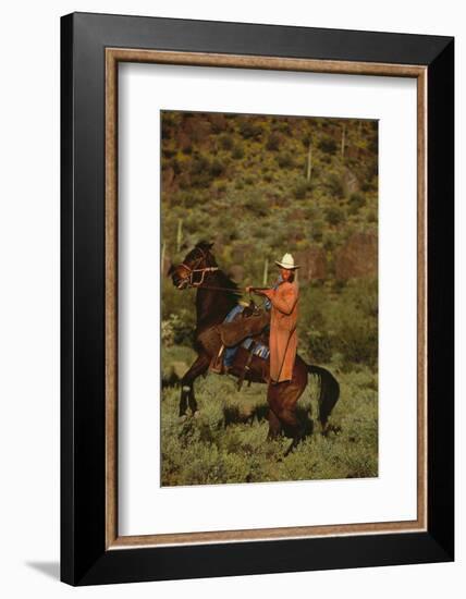 Cowboy Riding a Horse-DLILLC-Framed Photographic Print