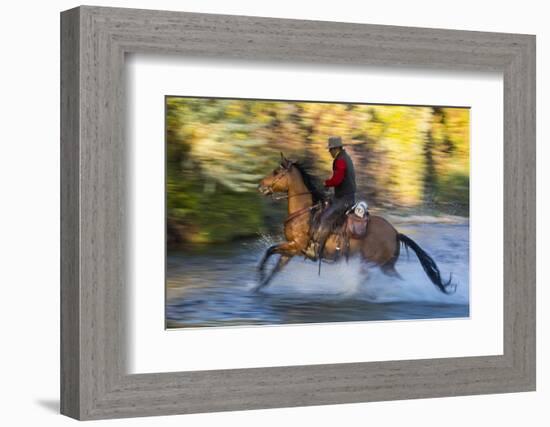 Cowboy Riding through River on a Horse-Terry Eggers-Framed Photographic Print