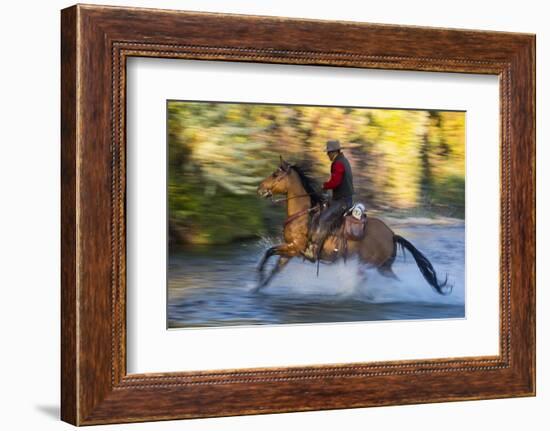 Cowboy Riding through River on a Horse-Terry Eggers-Framed Photographic Print