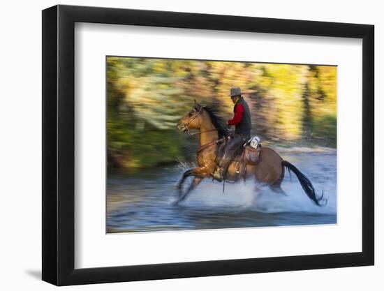 Cowboy Riding through River on a Horse-Terry Eggers-Framed Photographic Print