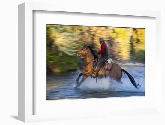 Cowboy Riding through River on a Horse-Terry Eggers-Framed Photographic Print