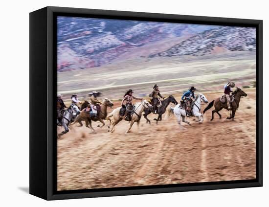 Cowboy's in Motion across the Field-Terry Eggers-Framed Premier Image Canvas