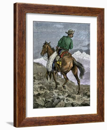 Cowboy Searching for Stray Cattle in the Rocky Mountains-null-Framed Giclee Print