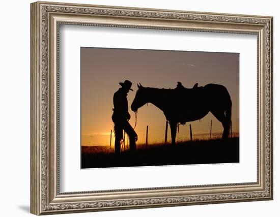 Cowboy Standing with His Horse-Darrell Gulin-Framed Photographic Print