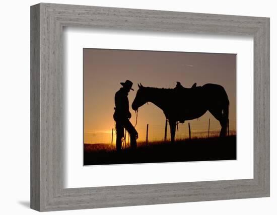 Cowboy Standing with His Horse-Darrell Gulin-Framed Photographic Print