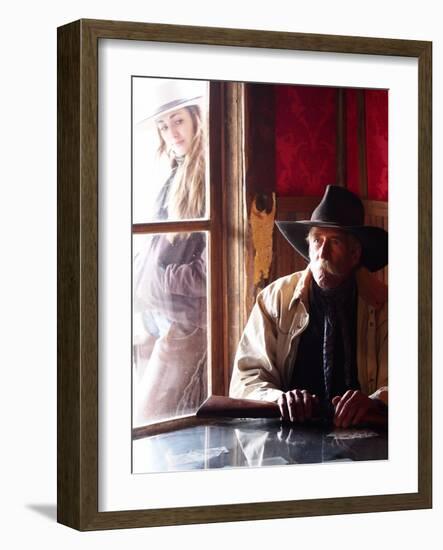 Cowboy with Rifle and Cowgirl Looking over His Shoulder-Terry Eggers-Framed Photographic Print