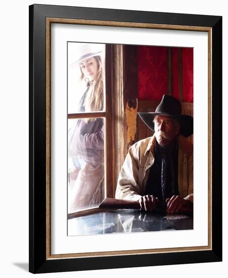 Cowboy with Rifle and Cowgirl Looking over His Shoulder-Terry Eggers-Framed Photographic Print