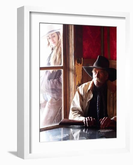 Cowboy with Rifle and Cowgirl Looking over His Shoulder-Terry Eggers-Framed Photographic Print