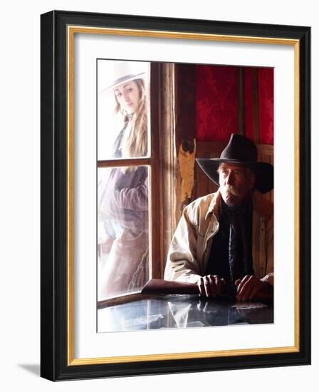 Cowboy with Rifle and Cowgirl Looking over His Shoulder-Terry Eggers-Framed Photographic Print