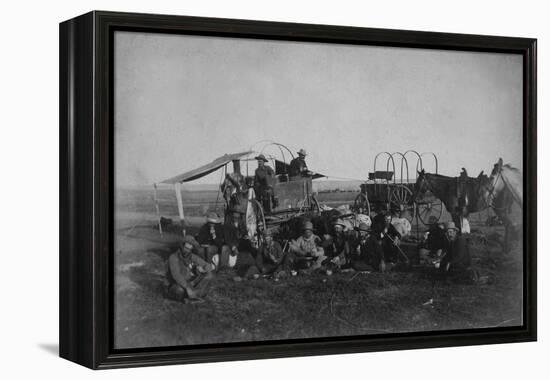 Cowboys At The Chuck Wagon-null-Framed Stretched Canvas