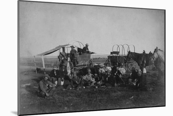 Cowboys At The Chuck Wagon-null-Mounted Art Print