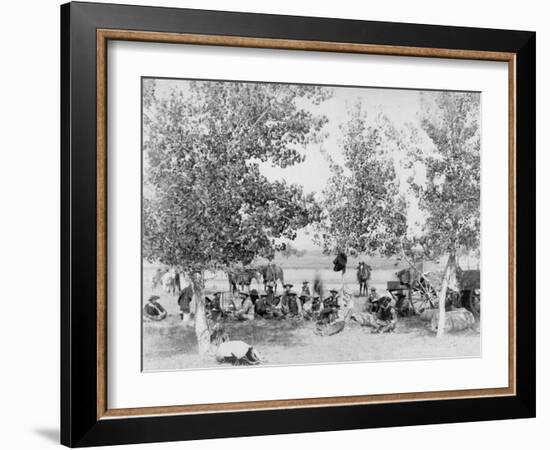 Cowboys Eating Dinner on Ground Under Trees Photograph - South Dakota-Lantern Press-Framed Art Print