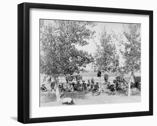 Cowboys Eating Dinner on Ground Under Trees Photograph - South Dakota-Lantern Press-Framed Art Print