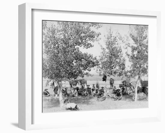 Cowboys Eating Dinner on Ground Under Trees Photograph - South Dakota-Lantern Press-Framed Art Print