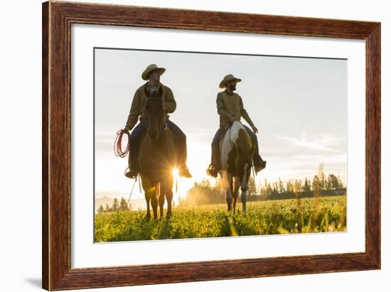 Cowboys Riding across Grassland with Moutains Behind, Early Morning, British Colombia, B.C., Canada-Peter Adams-Framed Photographic Print