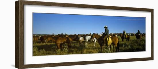 Cowboys Riding Horses in a Field-null-Framed Photographic Print