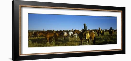 Cowboys Riding Horses in a Field-null-Framed Photographic Print