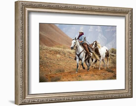 Cowgirl at Full Gallop with Horses in Tow-Terry Eggers-Framed Photographic Print