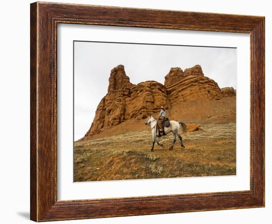Cowgirl at Full Gallop with Red Rock Hills-Terry Eggers-Framed Photographic Print