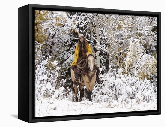 Cowgirl Riding in Autumn Aspens with a Fresh Snowfall-Terry Eggers-Framed Premier Image Canvas